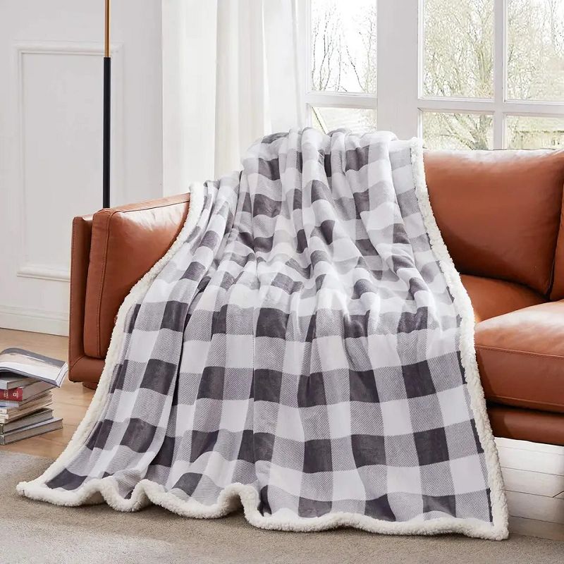 Manta Sherpa a quadres en blanc i negre